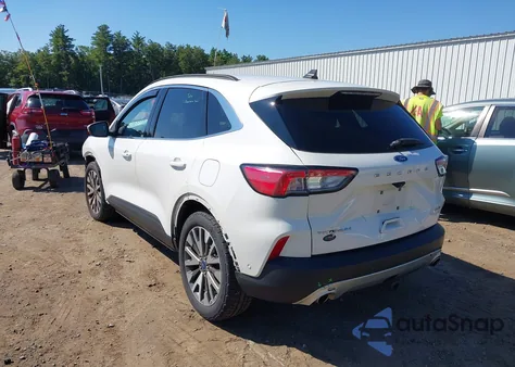 2020 Ford Escape Titanium z USA, uszkodzony, nr VIN 1FMCU9J98LUB15425